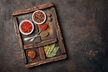 Wall Mural - Different spices, dry kitchen herbs and seeds for tasty meals in wooden drawer