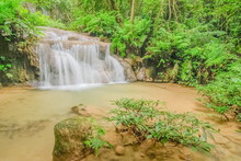 View Of Silky Waterfall Flowing Around With Green Forest Background, Pu Kaeng Waterfall, Doi Luang National Park, Chiang Rai, Northern Of Thailand.