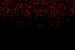 abstract waterfalls of red glitter sparkle bubbles particles bokeh on black background,christmas and happy new year holiday