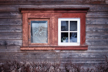 The  Old One Vs New One.Two Old Windows In The Wall Of Ancient Latvian Wooden House.