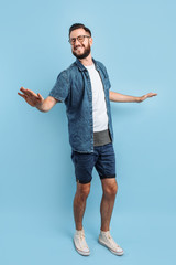 Wall Mural - Young man with glasses