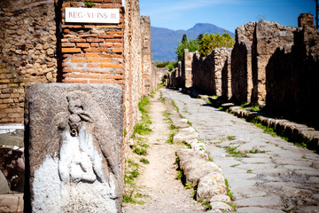 Wall Mural - Ancient fresco in a house in Pompeii, Pompeii destroyed by the eruption of Vesuvius in 79 BCPompei streetStreet of Pompeii excavations after Vesuvius eruption, Naples. Italy