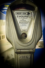 Vintage Parking Meter. Coin Operated Vintage Parking Meter In Vertical Orientation.