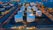 © Kalyakan - Aerial view oil and gas terminal storage tank farm,Tank farm storage chemical petroleum petrochemical refinery product, Business commercial trade fuel and energy transport by tanker vessel.
