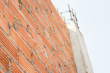 Close up view of a brick wall on a construction site, Construction concept.