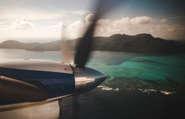 Small propeller plane flying from San Andres to Isla de Providencia, a Colombian paradise island in the Caribbean Sea