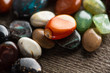Close up view of fortune telling stones on wooden surface