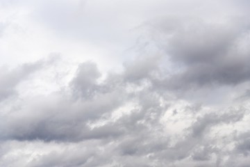 Wall Mural - Dramatic gray clouds in the sky. Beautiful gray and white cloudy sky