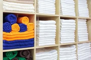 Leinwandbilder - Fresh White Hotel Towels Folded and Stacked on a Shelf