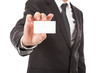 © themanofsteel - Gray haired businessman holding card