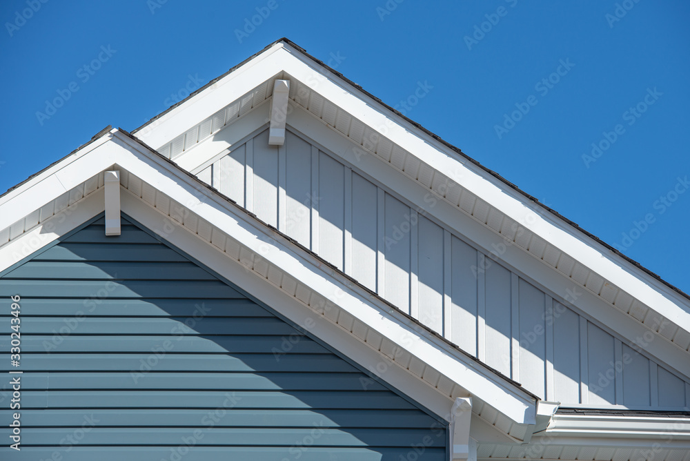 Horizontal Gables Double gable, with white decorative corbel, bracket, brace on a ...