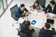 Top view of  asian business people team analyzing statistics financial. High angle view of a team of businesspeople Meeting Conference Discussion Corporate Concept in office.