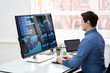 © Andrey Popov - Businessman Analyzing Graphs On Computer