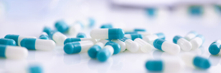 Wall Mural - Tablets scattered on the table of the pharmaceutical laboratory pill for the prescription and treatment of various diseases chemistry