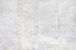 © prapann - Marble tiles seamless wall texture patterned background.