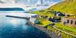 View from flying drone. Aerial summer view of Kirkjubour villagewith Hestur Island on background. Picturesque morning scene of Faroe Islands, Denmark, Europe.  Beauty of nature concept background.