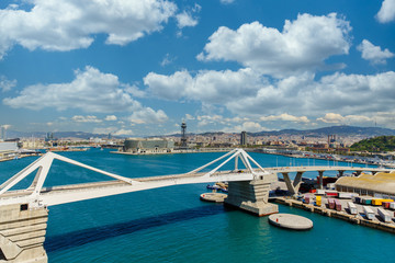 Poster - White bridge across blue water of Barcelona Harbor