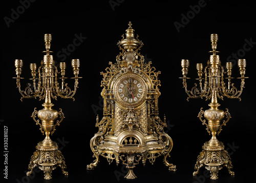 photo Black And Gold Candlesticks adobe stock