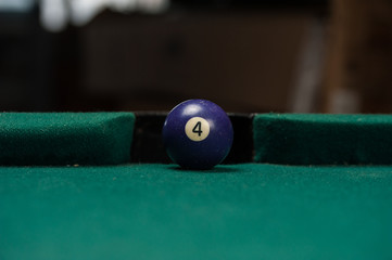 Billiards balls and cue on billiards table. Billiard sport concept