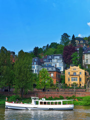 Wall Mural - Embankment of Neckar river and ship in Heidelberg of Germany