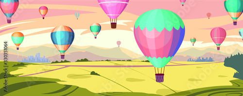 Fotomural Colorful hot air balloons fly in orange sky over amazing valleys