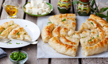 Traditional Feta Cheese Phyllo Pastry Pie, Banitsa. Wooden Background.