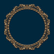 Vintage gold round frame with border scroll pattern. Ornate golden label on dark blue background. Circle picture frame in baroque style. 