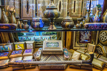 Sticker - Decorated wooden boxes for sale on the Grand Bazaar also called Qeysarriyeh or Soltani bazaar in Isfahan city, Iran