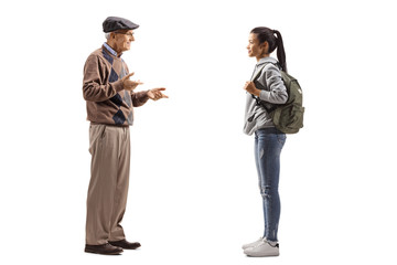 Canvas Print - Female student and a senior man having a conversation