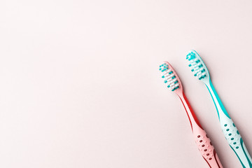 Dental hygiene concept. Two colorful toothbrushes. Flat lay