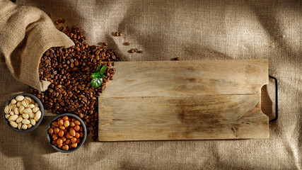 Wall Mural - Fresh coffee on a jute sack in the Brazilian morning with free space for an advertising product