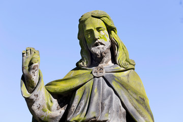 Historic Jesus on the mystery old Prague Cemetery, Czech Republic