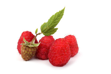 Raspberries, unripe raspberry and leaf