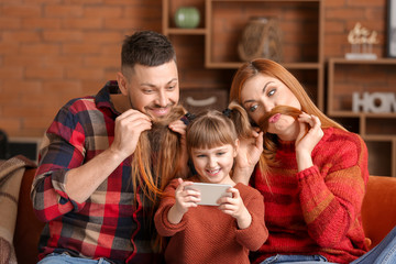 Sticker - Family taking selfie at home