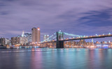 Fototapeta  - Night view of Manhattan and Brooklyn bridge