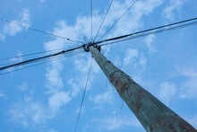 Wooden Pole On Blue Sky