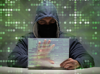 young hacker in data security concept