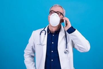 doctor with mask, stethoscope and cellphone, coronavirus virus concept and infections