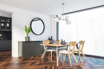 Panoramic white dining room corner with mirror