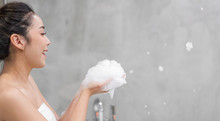 Portrait Of Smiling Of Happy Beautiful Pretty Asian Woman Clean Fresh Healthy White Skin Enjoy Relaxing Taking Shower And Bath With Soap Bubble Foam On Hand In Bathtub At The Bathroom