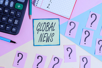 Handwriting text writing Global News. Conceptual photo world noteworthy information about recent or important events Mathematics stuff and writing equipment above pastel colours background