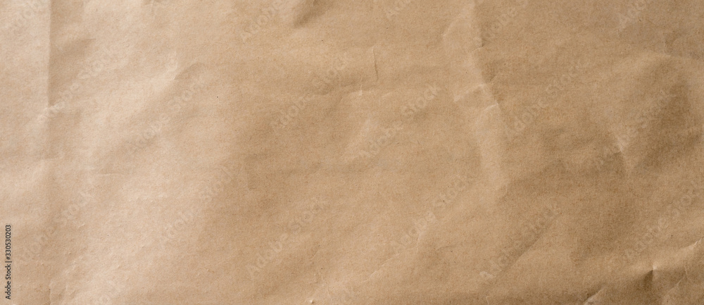 crumpled brown paper background and texture with copy  space. - obrazy, fototapety, plakaty 