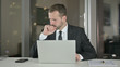 © stockbakers - The Sick Businessman having Coughing in Office at Night