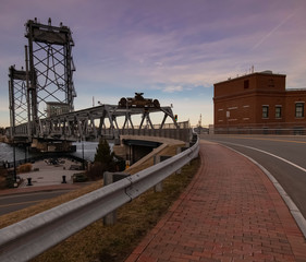 Wall Mural - Sunset view of Memorial Bridge from sidewalk - Portsmouth, New Hampshire.