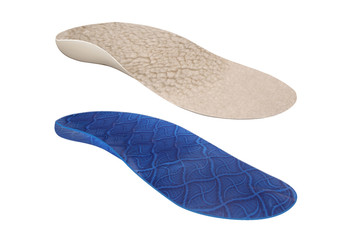 Isolated orthopedic insole on a white background. Treatment and prevention of flat feet and foot diseases. Foot care, comfort for the feet. Wear comfortable shoes. Medical insoles.