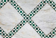 Geometric Green Tiles In Diamond Pattern On Marble Floor