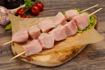 Raw pork meat skewer for grill