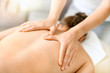 © Milan - Body care hands detail.  Young athlete girl having a back massage, relaxing in spa salon,