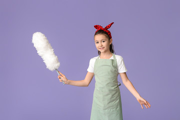 Poster - Little housewife with dust brush on color background