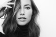 © Martin Villadsen - Black and white portrait of a young serious woman looking directly in camera